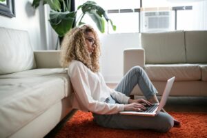 woman freelancer working remotely at home